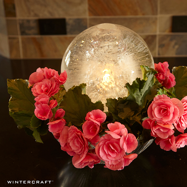 https://www.wintercraft.com/cdn/shop/products/Wintercraft-Globe-Ice-Lantern-Centerpiece-with-Fresh-Flowers-597_1200x.png?v=1659641720